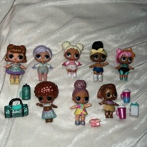 L.O.L DOLLS (8 included in purchase) with 4 cups, 1 purse, 1 backpack.